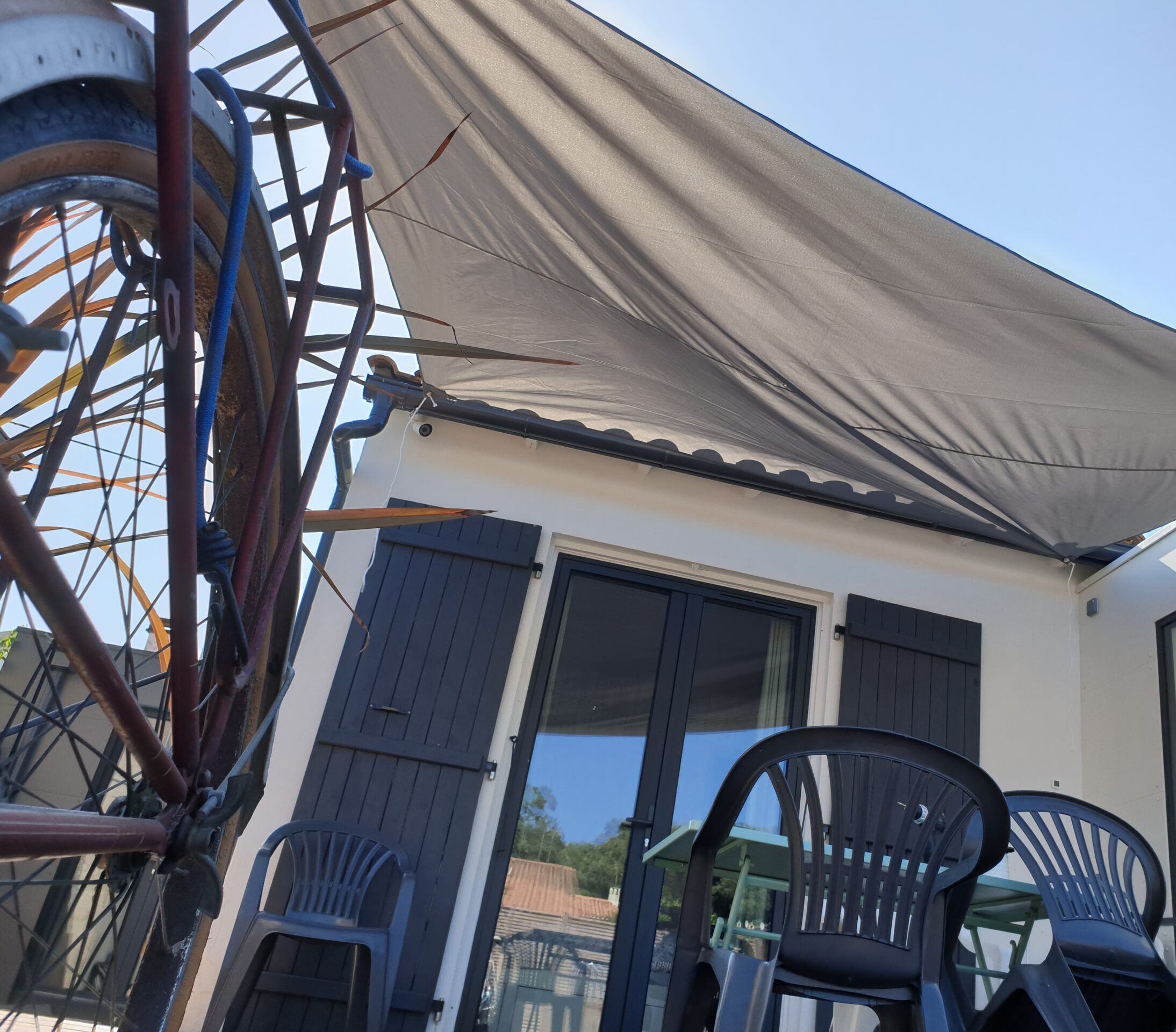 Terrasse et voile d'ombrage